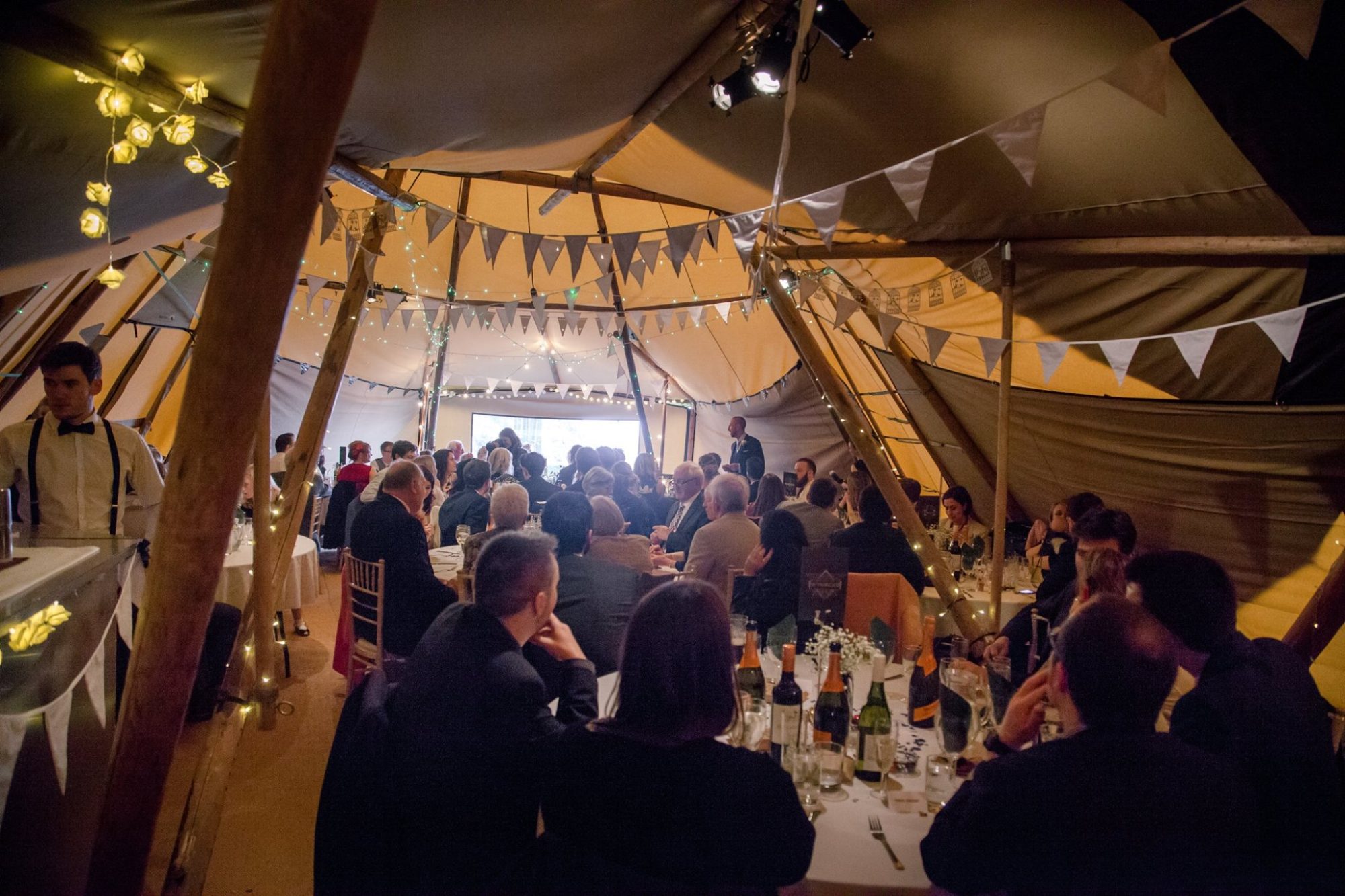 Inside Wedding marquee full of people having a drink in Whitehead, Northern Ireland